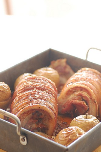 Slow roasted pork belly with baked apple & onion