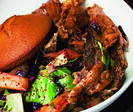 Slow-roasted pork shoulder with bacon broth and corn bread