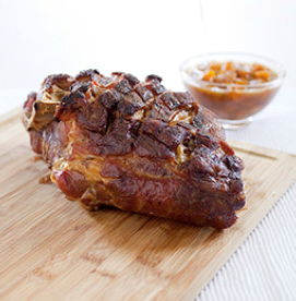 Slow-roasted pork shoulder with peach sauce