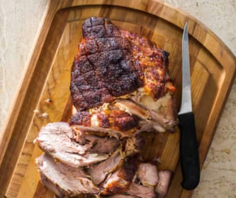 Slow-roasted pork shoulder with peach sauce