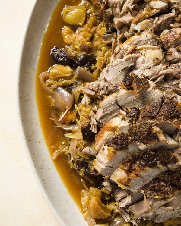 Slow-roasted pork with sauerkraut, apples and dried fruits