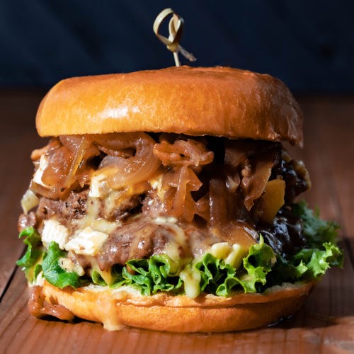 Smash burgers with Camembert and caramelized onion and bacon jam