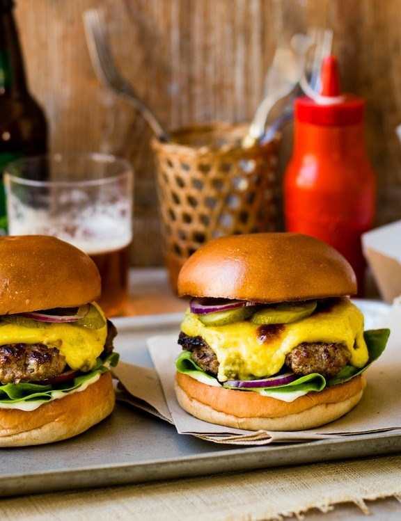 Smashed burgers with jalapeño rarebit