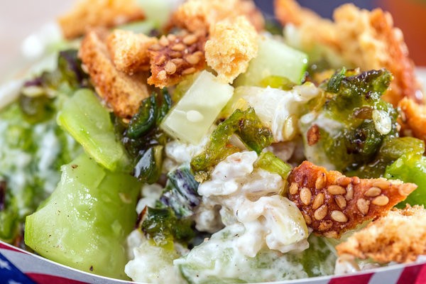 Smashed cucumbers with lime yogurt, spicy honey and breadstick croutons