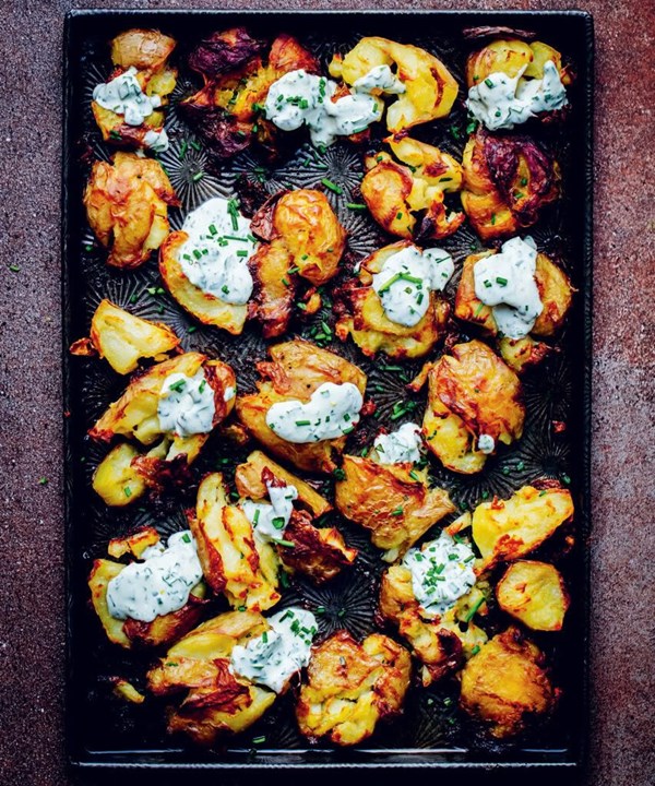 Smashed kūmara & spuds with creamy herb dressing
