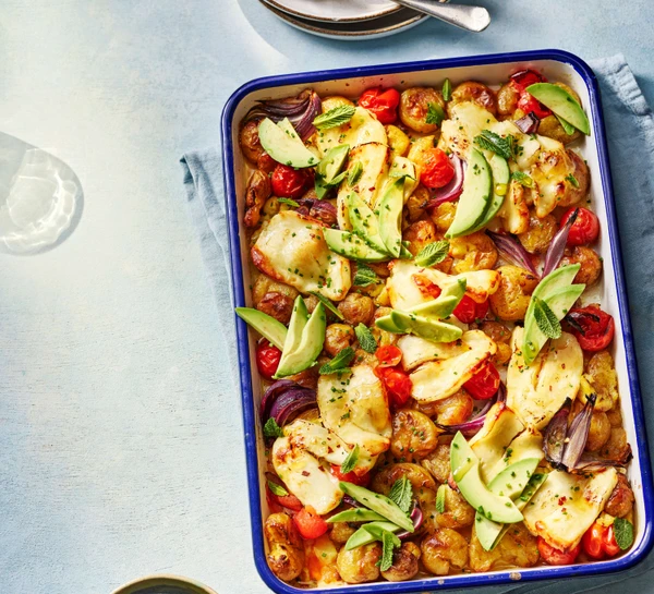 Smashed potato and halloumi traybake