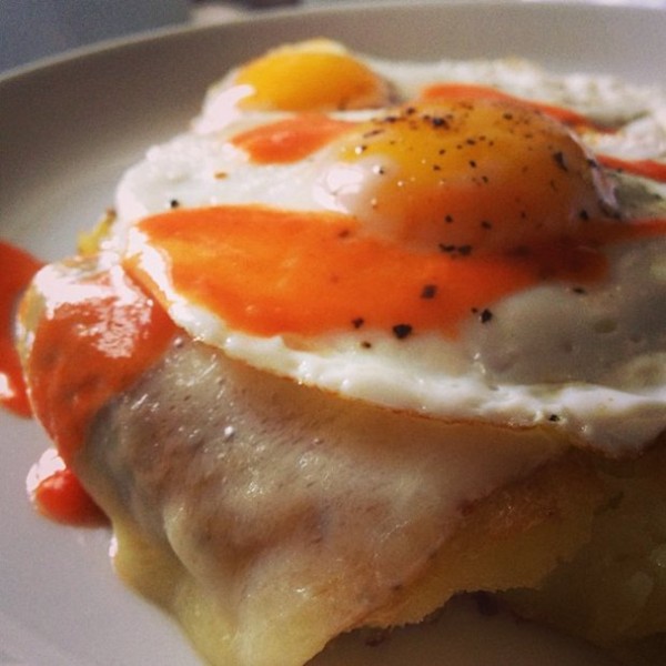 Smashed potato bomb with fried eggs