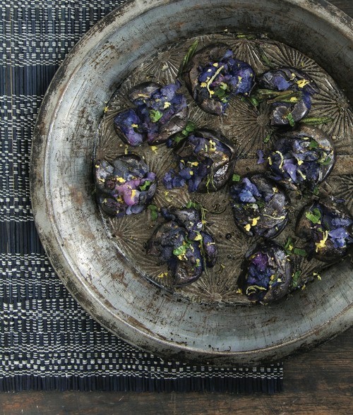 Smashed purple potatoes with parsley