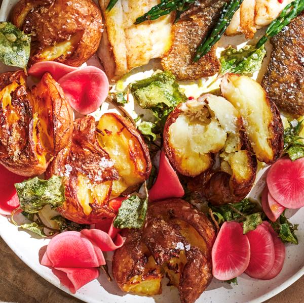 Smashed salt and vinegar potatoes with pickled radish