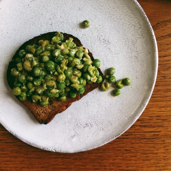 Smashed tahini peas on toast