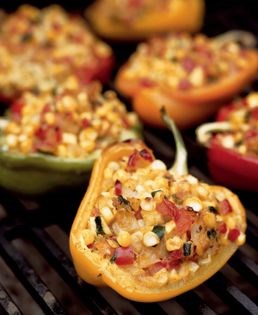 Smoke-roasted bell peppers stuffed with garden vegetables