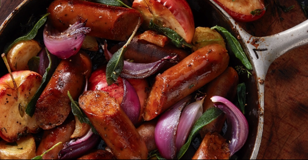 Smoked apple & sage sausages with roasted vegetables in a buttery cider glaze