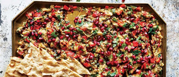 Smoked aubergine, pepper and walnut salad with pomegranate