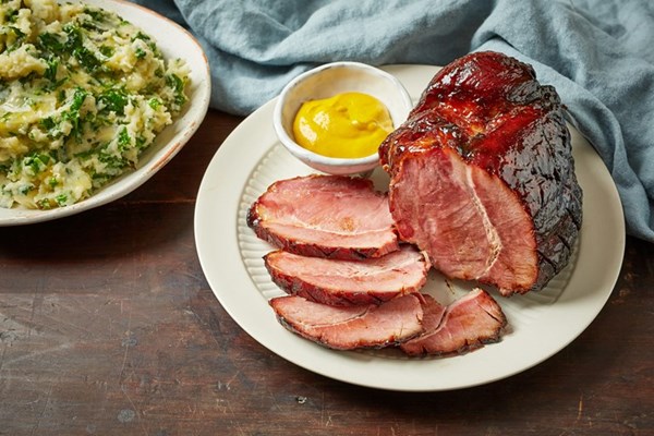 Smoked bacon joint with black butter glaze and colcannon