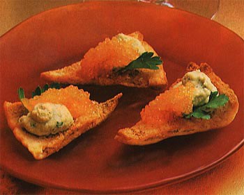Smoked caviar and hummus on pita toasts