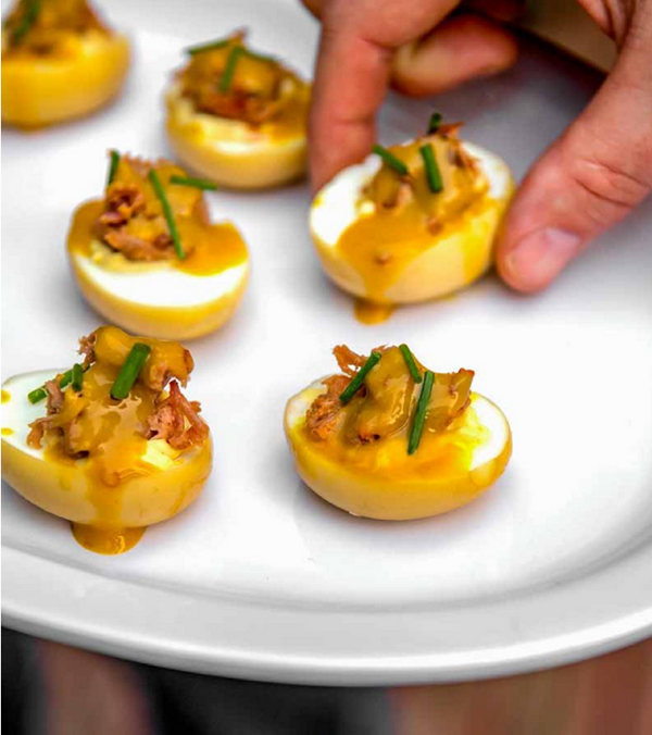 Smoked deviled eggs with shredded pork
