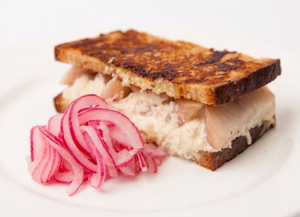 Smoked eel sandwich with onion pickle