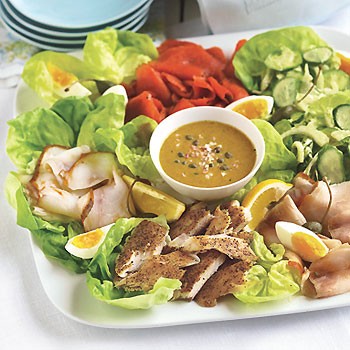 Smoked fish platter with mustard-caper sauce and fennel-cucumber salad