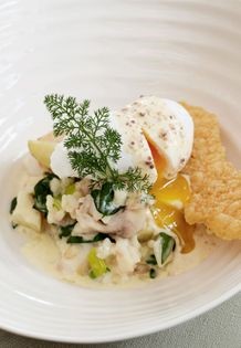 Smoked haddock risotto (Carnaby smoked haddock and pearl barley risotto, poached duck egg, grain mustard cream and Parmesan tuile)
