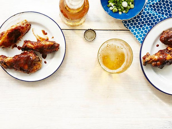 Smoked jerk chicken wings with spicy honey-tamarind glaze