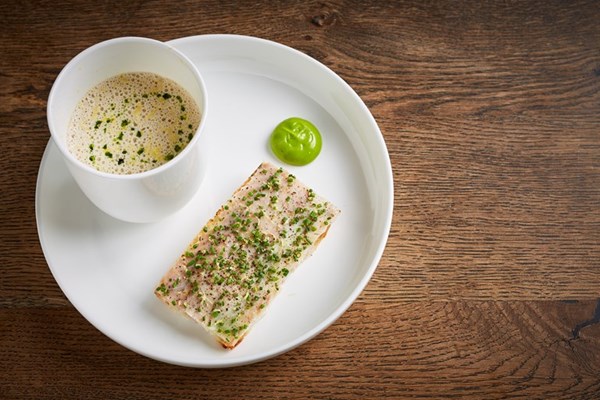 Smoked mackerel velouté with warm smoked eel soldiers and lovage