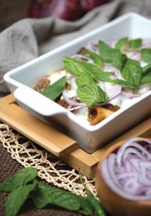 Smoked mutton with yoghurt (Dhuwan dahi gosht)