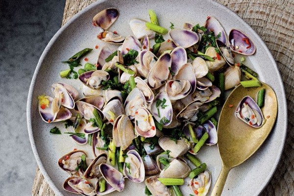 Smoked pipis with chilli and garlic shoots