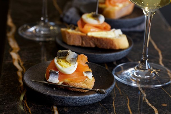 Smoked salmon and quail eggs