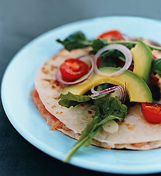 Smoked-salmon quesadillas with warm tomatoes and arugula