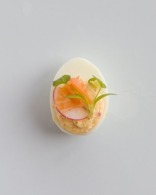 Smoked salmon-radish deviled eggs