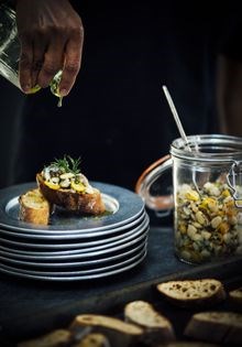 Smoked sardines and kumquat crostini
