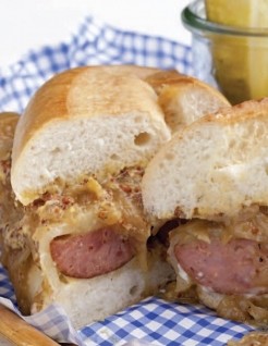 Smoked sausage sandwiches with beer-braised onions