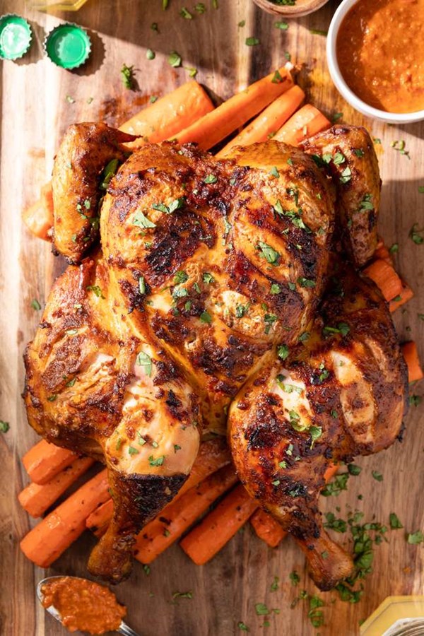Smoked spatchcock harissa chicken with carrots