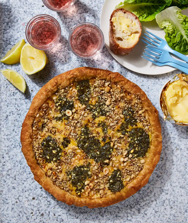 Smoked trout quiche with basil pesto and dukkah