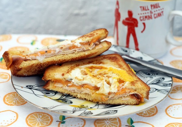 Smoked turkey and cheddar grilled cheese egg in the basket