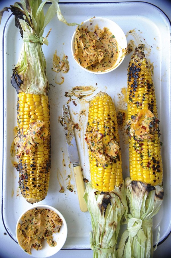 Smoky barbecued corn cobs with chipotle and lime butter