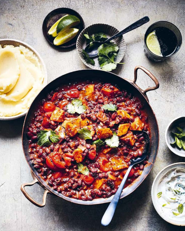 Smoky black bean stew with sweet potatoes and tangy mint dressing