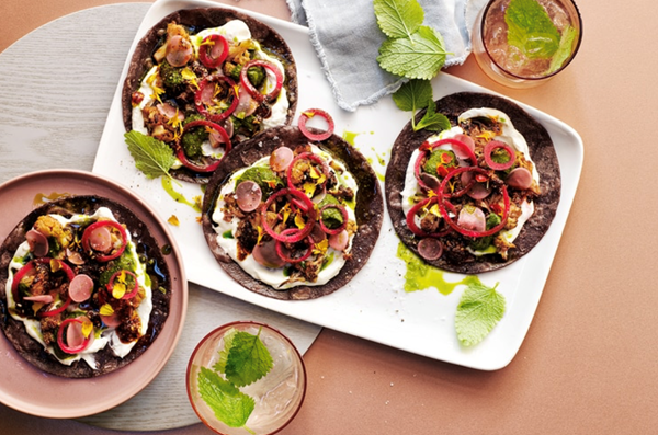 Smoky cauliflower tacos with salsa macha, broccoli joy and pickled onion
