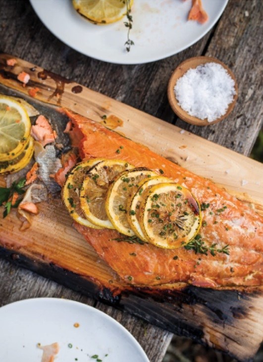 Smoky citrus, soy, and herb cedar-plank-grilled salmon