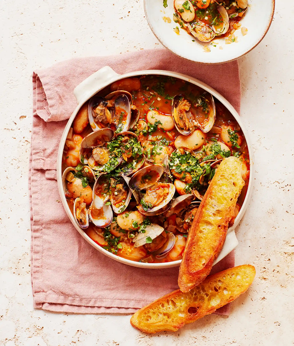 Smoky clams and butter beans with fried bread