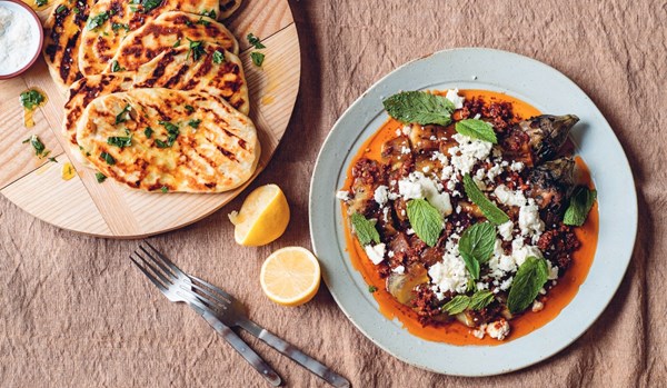 Smoky eggplant with garlic, harissa, mint and feta, with yoghurt flatbreads