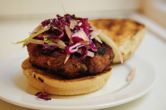 Smoky pork burgers with fennel and red cabbage slaw