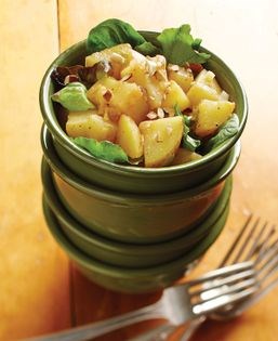 Smoky potato salad over greens