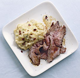 Smoky rib-eye steaks with loaded mashed potatoes