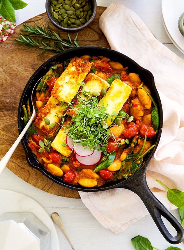 Smoky saffron baked beans with greens and halloumi