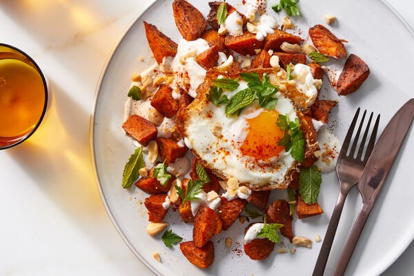 Smoky sweet potatoes with eggs and almonds