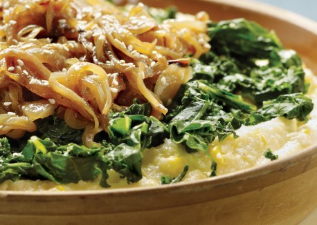 Smothered cheese grits and steamed greens