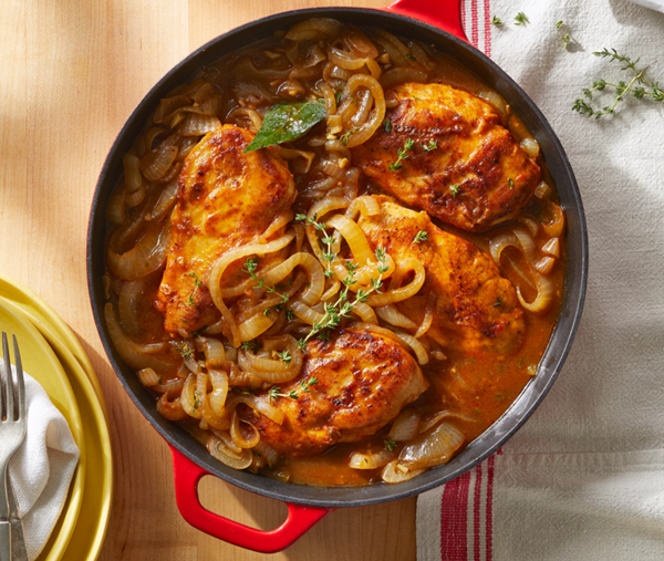 Smothered chicken breasts in onion gravy