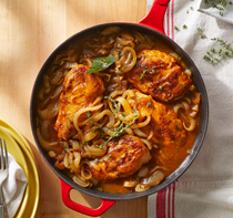 Smothered chicken breasts in onion gravy
