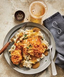 Smothered chippin’ and dippin’ fried chicken